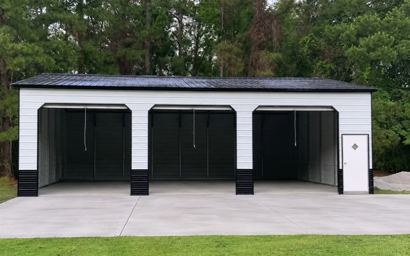 Insulated metal building interior showing insulation fitted between steel framing