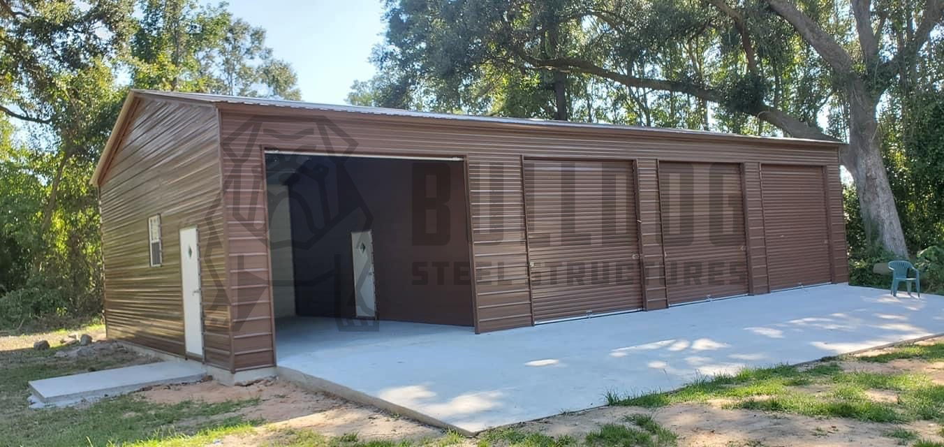 custom brown metal garage on concrete pad